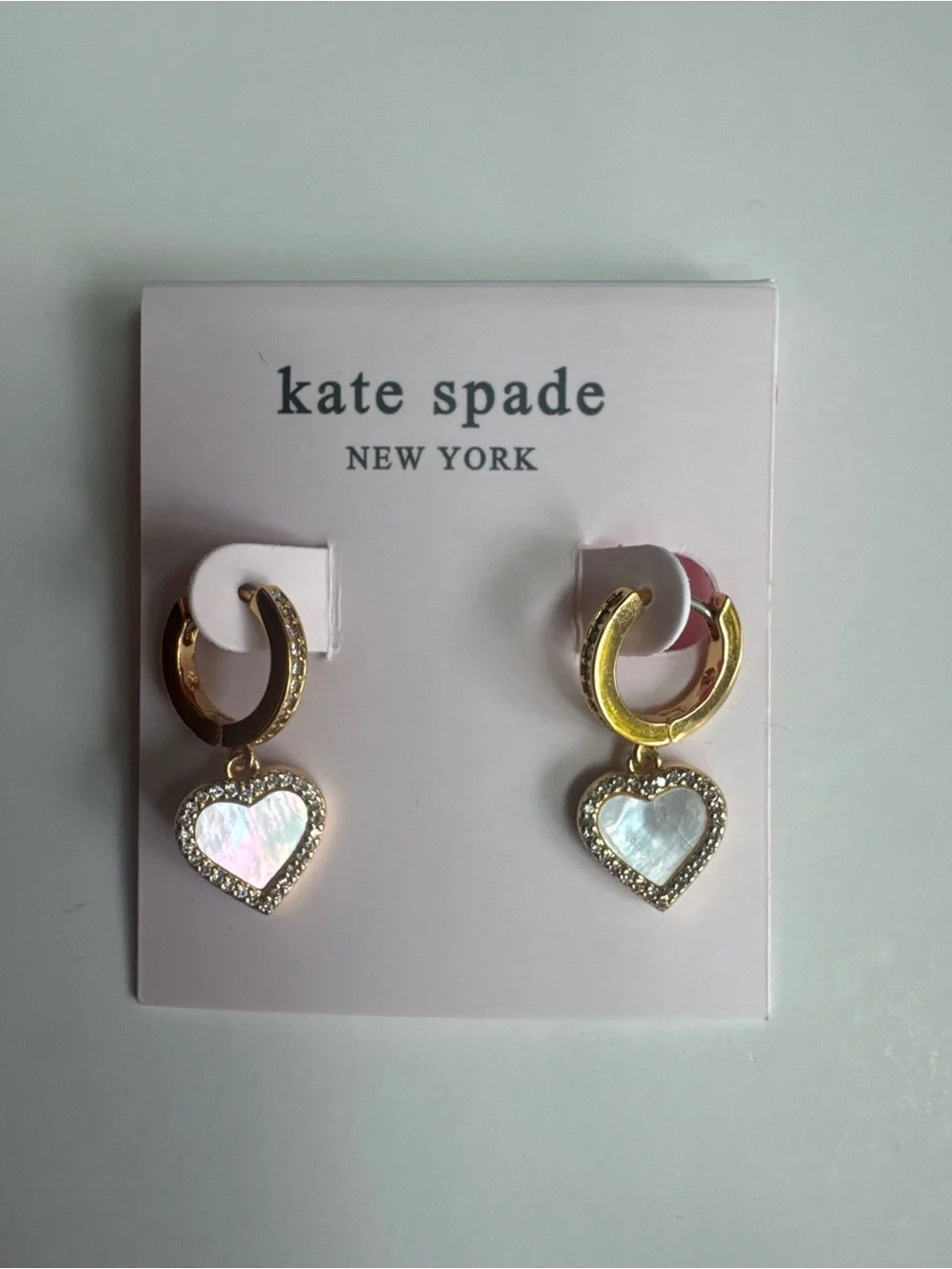 Kate Spade Mother of Pearl Gold Heart Huggies earrings